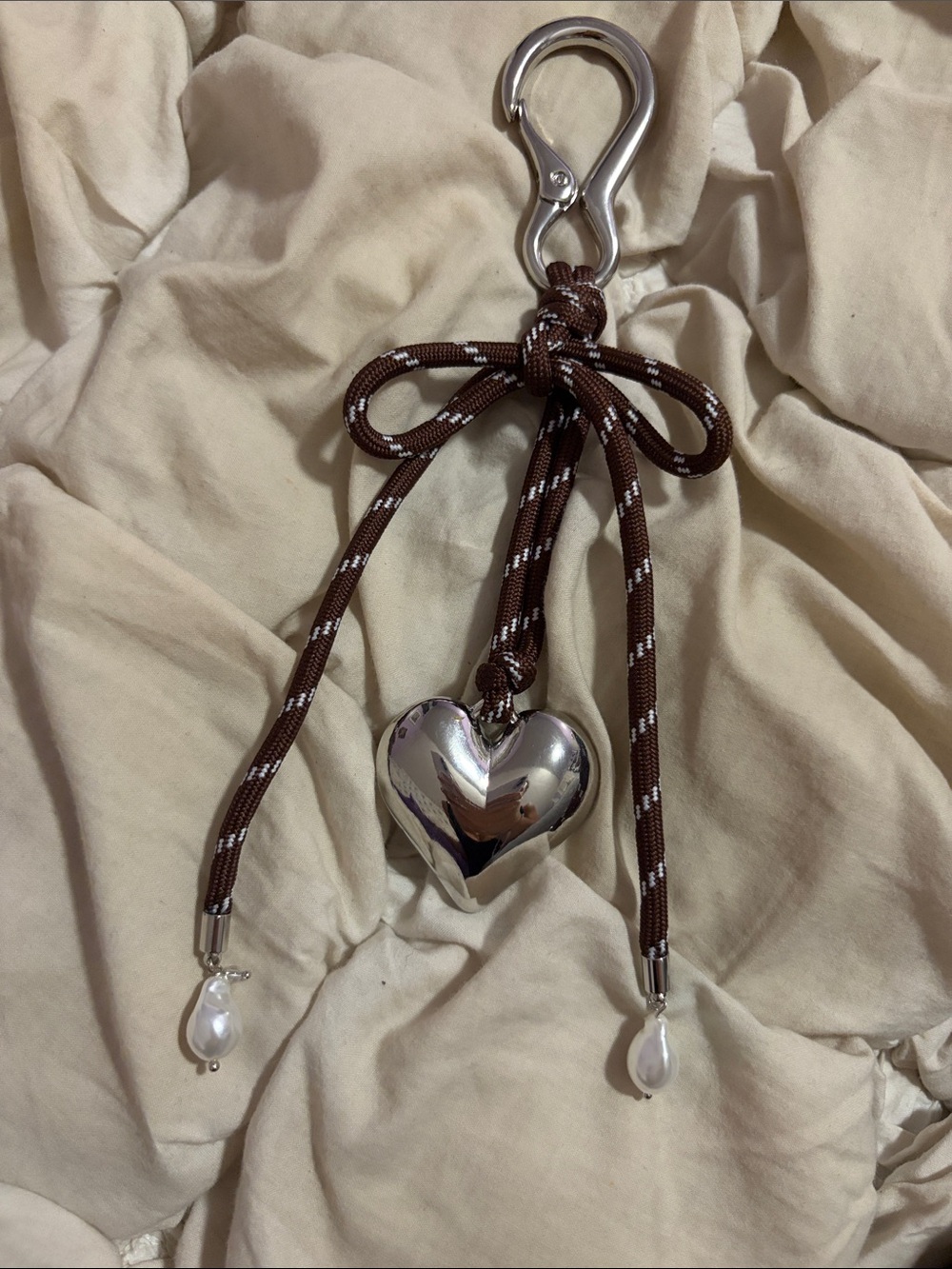 Free People Silver Hardware Brown and White Cord Bow Heart Pearl Bag Charm